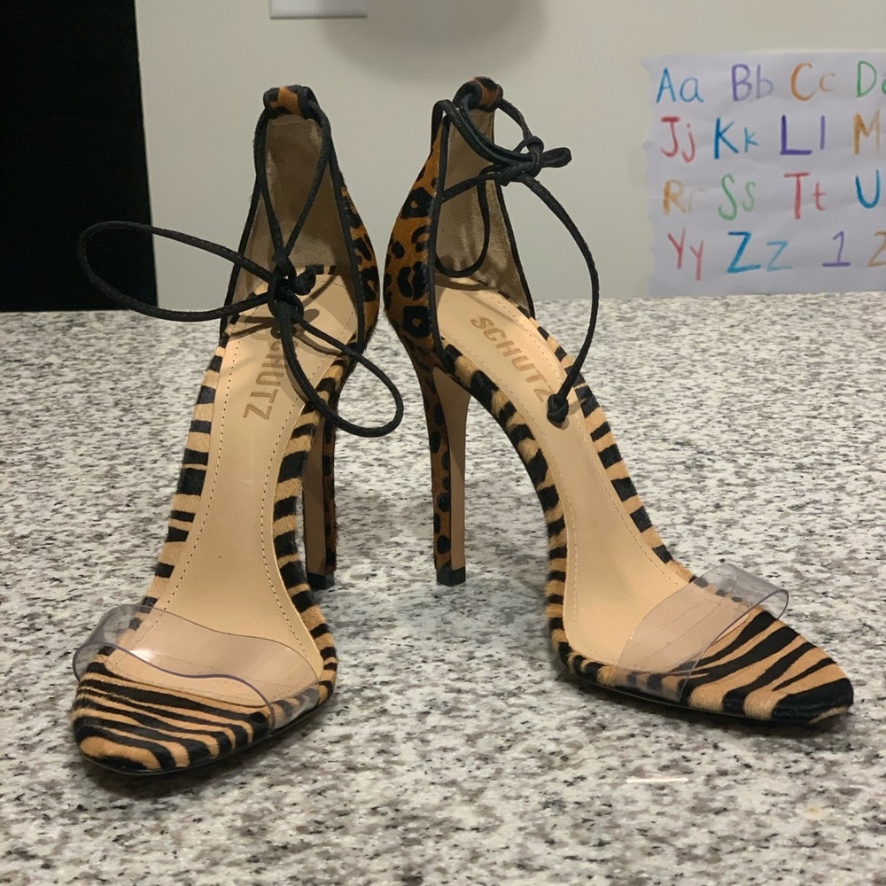 Schultz strappy leopard and brown zebra heels